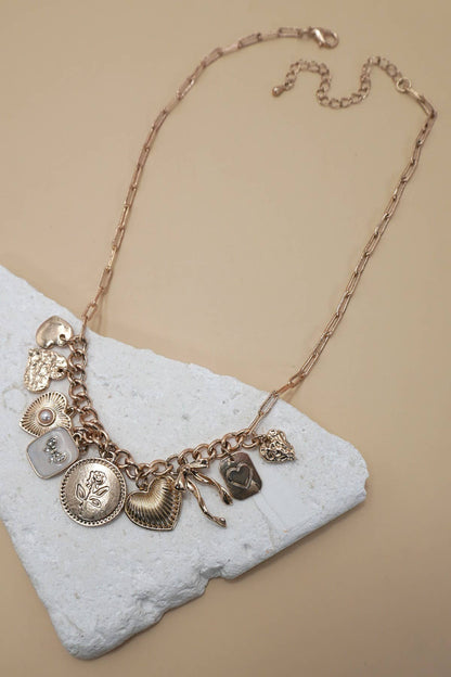 CHARM NECKLACE-CUSTER BOW HEART PEARL LINK